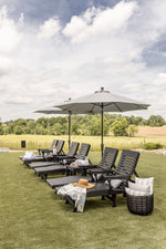 Casual Back Chaise Lounges and Rectangular End Table in Black